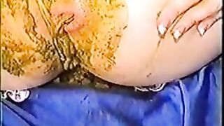 Blonde babe smears shit all over her ass and body