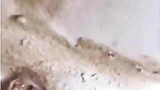 Skinny brunette caked in shit from head to toe
