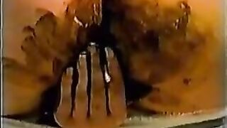 Kinky lady smearing dark shit