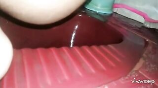 Amateur lady shitting in the toilet