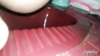 Amateur lady shitting in the toilet