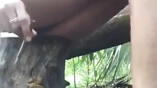 Cute naked babe poops outdoor in the forest