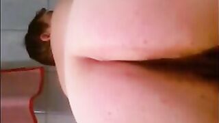 Woman shitting diharrea in closeup