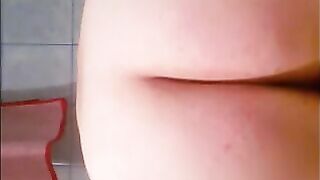 Woman shitting diharrea in closeup