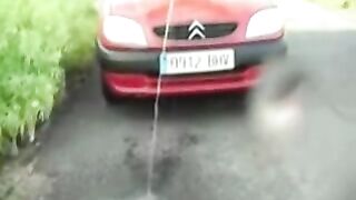 Babe pissing on the car