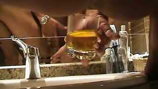 Bathroom own pee drinking babe