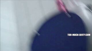 Blonde milf shitting in the toilet standing