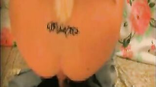 Tattooed babe dropping shit