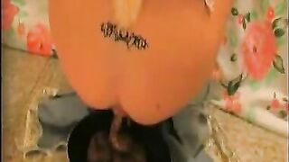 Tattooed babe dropping shit