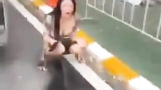 Crazy Asian whore caught pissing