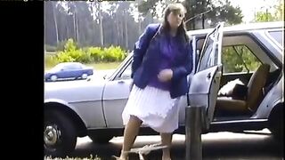 Mature lady Elizabeth piss on the road