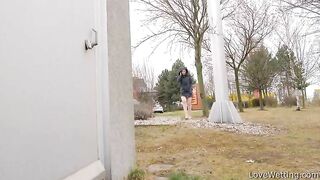 Pissing view from the back in the park