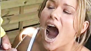 Pretty blonde girl taking pee in her mouth