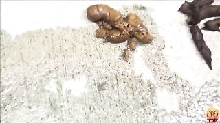 Well-dressed Asian woman shitting in the alley