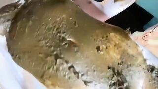 Nasty babe smearing shit heavily