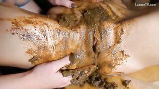 Kinky lesbian girls masturbates and licks shit