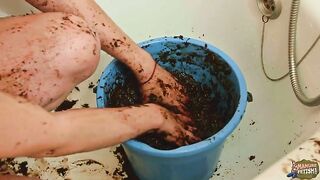 Lady masturbates with shit bucket