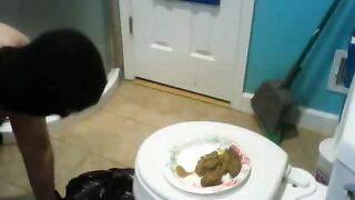 Mistress feeds messy shit to slave