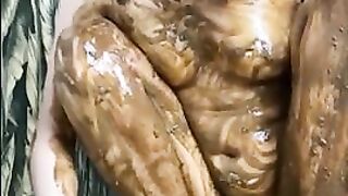 Skinny bitch smearing shit on her body