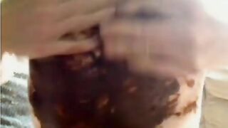 Horny lady smearing shit on her body