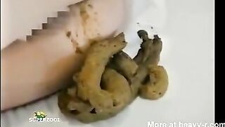 Cute Japanese sleeping girl shitting