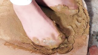 Dirty brown pantyhose glue of dog scat