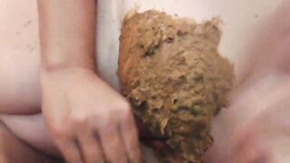 Asshole clenching while shit hangs out