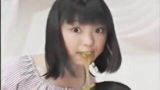 Girl shoves her face into a pile of warm shit