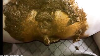 Girl playing with her own shit in bed