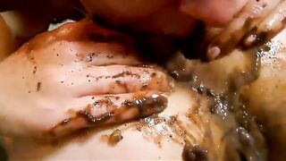 Girls eat shit from an enema off each others asses