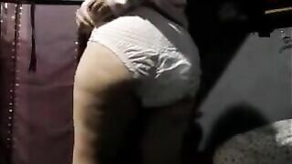 Girl wearing a diaper takes a big shit on the floor