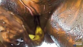 Betty shits and masturbates with a banana