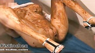 Busty milf gets covered heavily in the shit