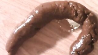Hairy Mom Produces Long Brown Turd