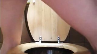 Fat butt babe shitting in the toilet