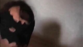 Masked babe shitting on the sheet