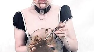 Beautiful maid smearing shit on her boobs