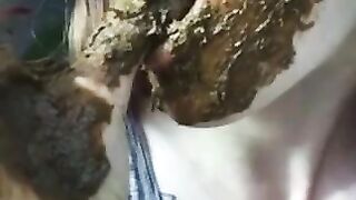 Huge tits lady smearing shit closeup