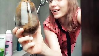 Cute brunette in glasses teasing and pooping show