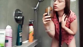 Cute brunette in glasses teasing and pooping show