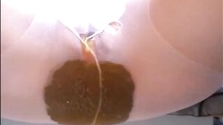 Woman's diarrhea on pantyhose