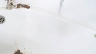 Messy bath enema solo