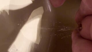 Fat mature lady pissing in the shower