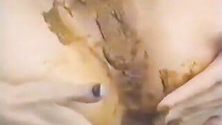 Nasty Retro babe rubbing shit