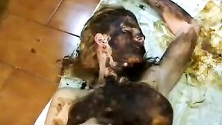 Blonde smearing shit on her sexy naked body