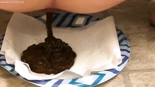 Dark nice messy poop on the plate