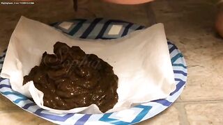 Dark nice messy poop on the plate