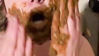 Girl smearing shit on her lovely face