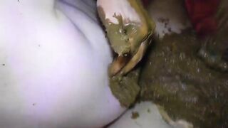 Girl takes a huge shit in a bathtub