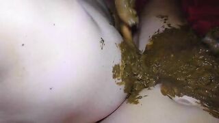 Girl takes a huge shit in a bathtub